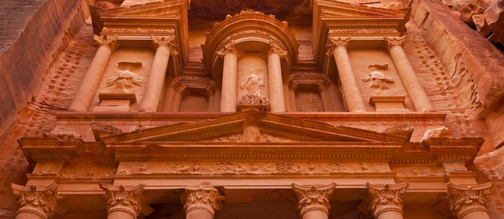 The Treasury or Al Khazneh palace in As-Siq canyon in the historic city of Petra, ancient capital of the Nabateans in Jordan, the Middle East, Asia, Unesco World Heritage Site