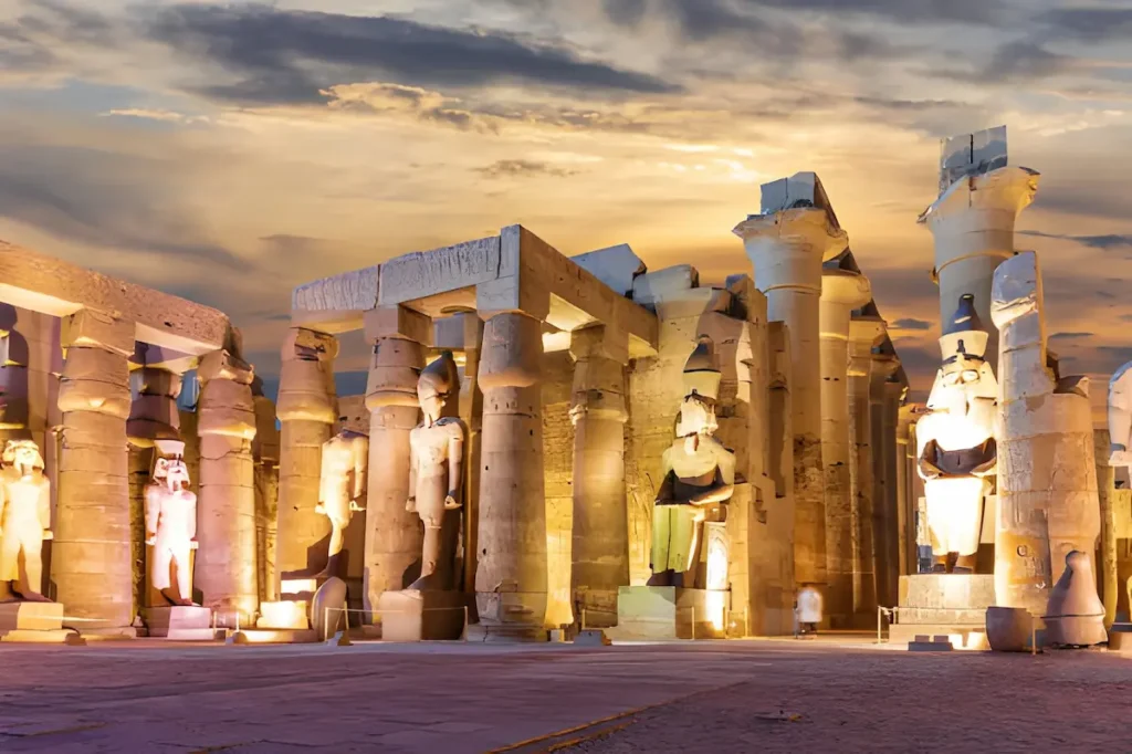 Columns and statues of the Luxor Temple, Egypt, evening view.