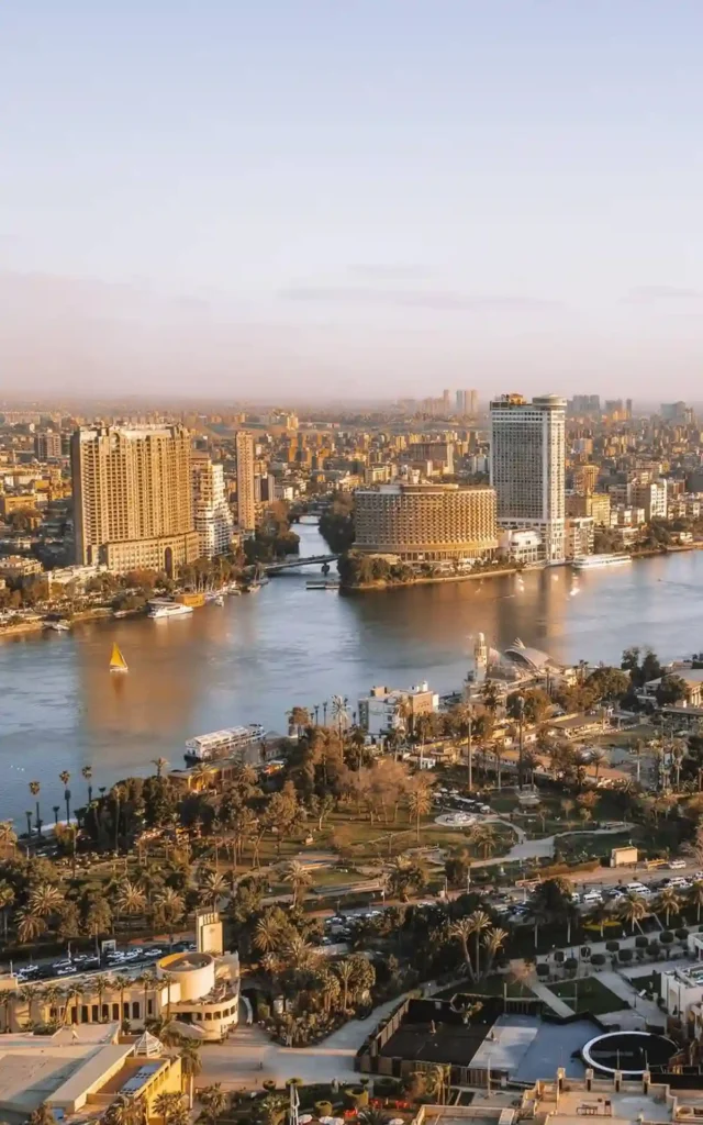 Aerial panorama sunset view of the Nile River and downtown Cairo seen from Cairo Tower