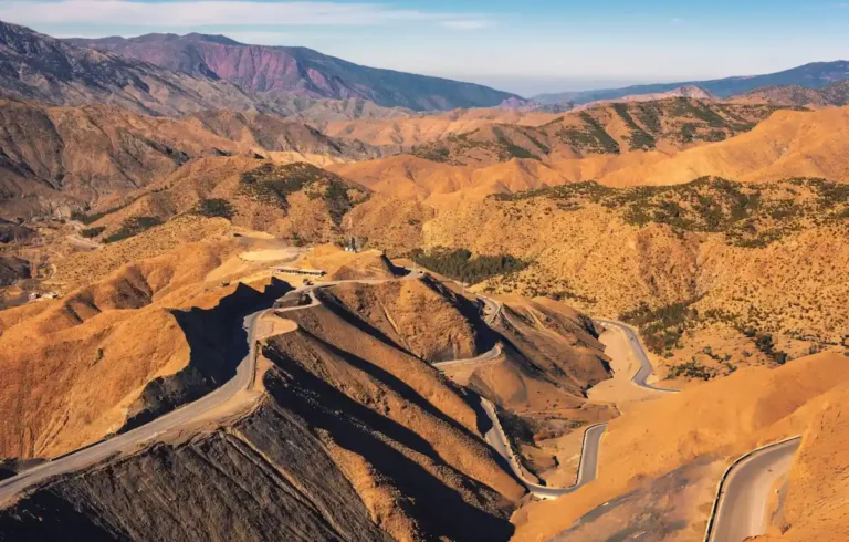 Mountain road through the Tizi-n-Tichka pass in the Atlas Mountains, Morocco. This mountain pass is connecting Marrakesh to the city of Ouarzazate.