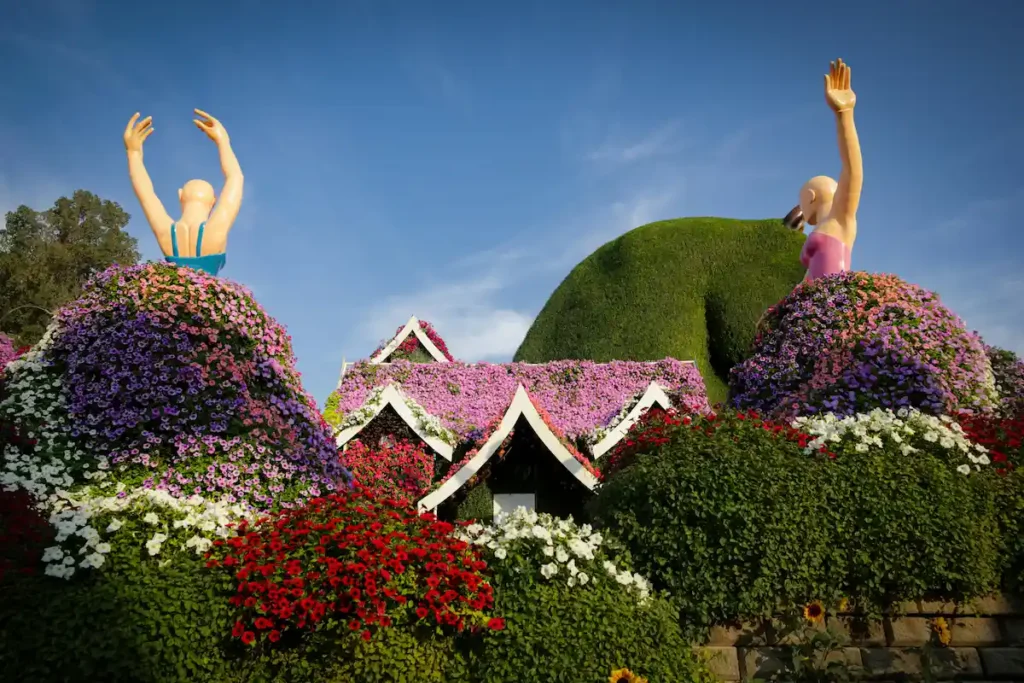 Vibrant Garden with Floral Sculptures in Bloom