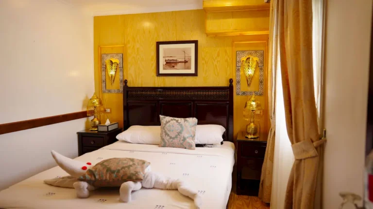 Furnished double cabin aboard Amoura Dahabiya with traditional Egyptian décor