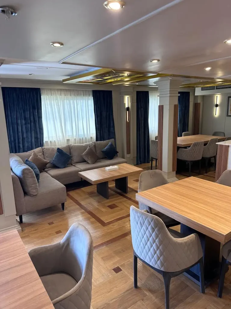 Merit I Dahabiya lounge and dining area with comfortable seating