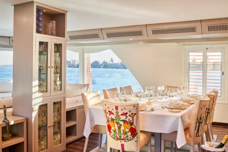 Indoor dining room aboard Mazaj Seba overlooking the Nile