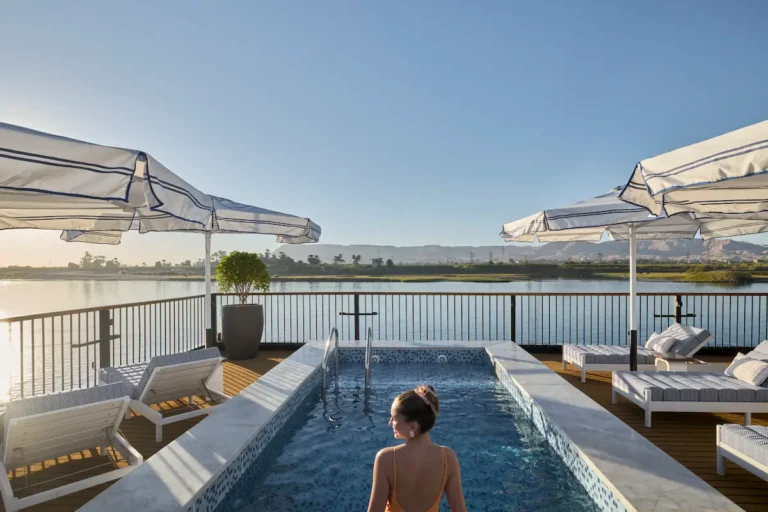 Mazaj Sia sundeck with outdoor swimming pool and Nile views